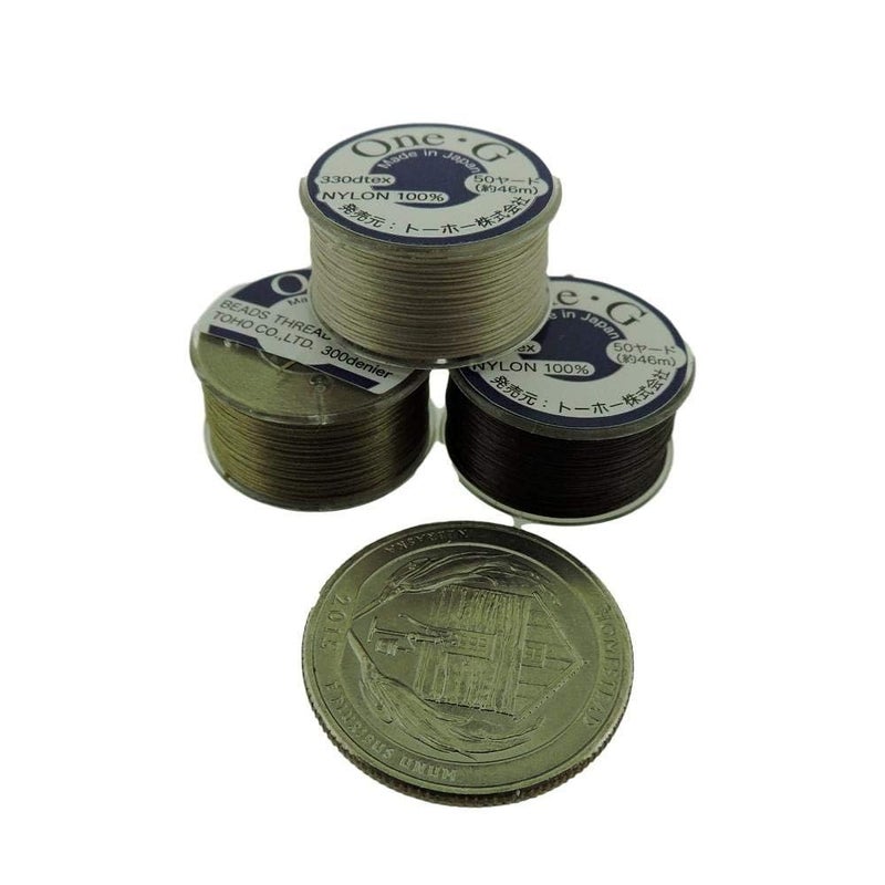 TOHO Bundle of 3 Colors: Toho One-G Beading Thread, 50 Yards per Bobbin, Beige, Brown & Sand Ash (Pack of 3 bobbins) - Image 2
